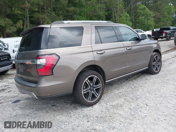 2019 Ford Expedition Limited with VIN 1FMJU1KT7KEA22116, listed as a IAAI auction lot 42276020 with 104,557 mi miles and . Bid and sale history available at DreamBid. Image 4.