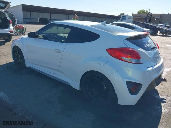 2014 Hyundai Veloster Turbo with VIN KMHTC6AE5EU201714, listed as a IAAI auction lot 40671069 with 151,901 mi miles. Bid and sale history available at carsss.com. Image 3.