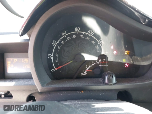 2012 Scion iQ with VIN JTNJJXB07CJ018562, listed as a IAAI auction lot 42404672 with 79,867 mi miles and . Bid and sale history available at DreamBid. Image 7.