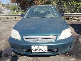 2000 Honda Civic VP with VIN 2HGEJ6616YH508231, listed as a IAAI auction lot 41869713 with 202,715 mi miles. Bid and sale history available at carsss.com. Image 6.
