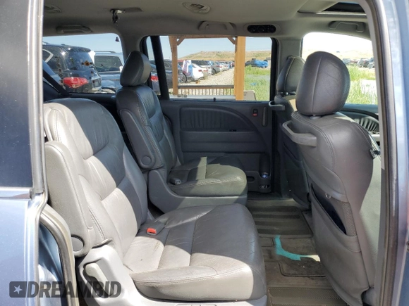 2006 Honda Odyssey EX-L z VIN 5FNRL38686B025733, wystawiony jako Copart lot #57657425 z przebiegiem 214 303 mil mil oraz Szkoda całkowita • Salvage title. Historia ofert i sprzedaży dostępna na DreamBid. Obrazek 11.