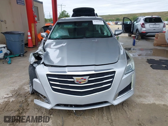 2016 Cadillac CTS Luxury Collection RWD z VIN 1G6AR5SXXG0128843, wystawiony jako IAAI lot #41404946 z przebiegiem 80 234 mil mil oraz . Historia ofert i sprzedaży dostępna na DreamBid. Obrazek 13.