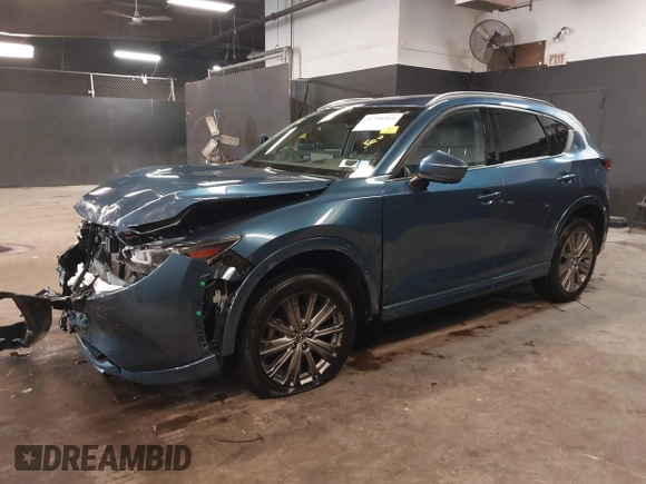 2023 Mazda CX-5 Signature with VIN JM3KFBXY4P0120187, listed as a IAAI auction lot 41706264 with 9,402 mi miles and . Bid and sale history available at carsss.com. Image 19.