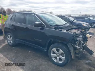 2019 Jeep Compass Latitude with VIN 3C4NJDBB3KT654330, listed as a IAAI auction lot 41968439 with 56,813 mi miles. Bid and sale history available at carsss.com. Image 1.