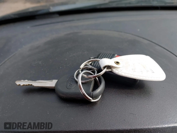 2007 Ford Focus S z VIN 1FAHP34N37W161610, wystawiony jako IAAI lot #42370742 z przebiegiem Nie podano mil oraz . Historia ofert i sprzedaży dostępna na DreamBid. Obrazek 11.