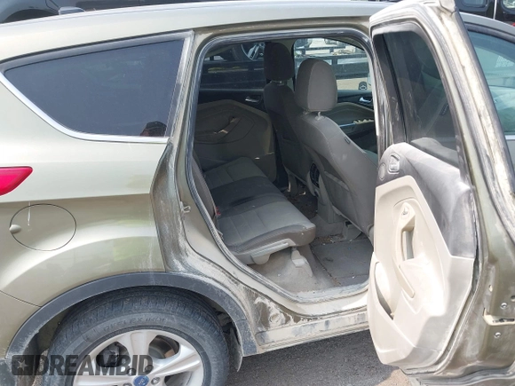 2013 Ford Escape SE z VIN 1FMCU9GX4DUC68312, wystawiony jako IAAI lot #42472030 z przebiegiem 134 070 mil mil oraz . Historia ofert i sprzedaży dostępna na DreamBid. Obrazek 8.