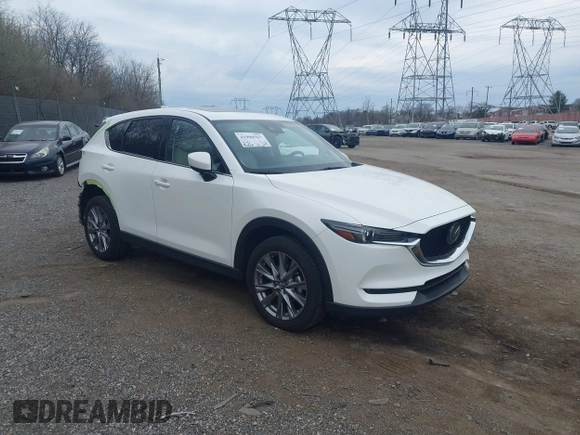 2020 Mazda CX-5 Grand Touring with VIN JM3KFBDM5L0731373, listed as a IAAI auction lot 41900567 with 31,268 mi miles and . Bid and sale history available at DreamBid. Image 1.