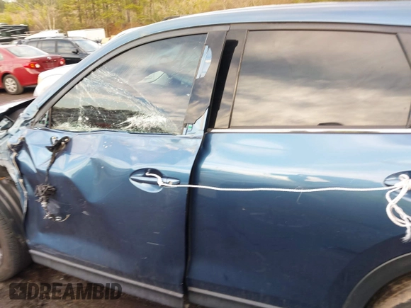 2020 Mazda CX-5 Grand Touring with VIN JM3KFADM4L0827733, listed as a IAAI auction lot 41482517 with 43,597 mi miles. Bid and sale history available at carsss.com. Image 14.