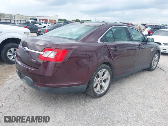 2011 Ford Taurus SEL with VIN 1FAHP2EW6BG120022, listed as a IAAI auction lot 42086866 with 271,643 mi miles. Bid and sale history available at carsss.com. Image 4.
