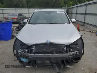 2018 BMW X1 sDrive28i z VIN WBXHU7C32J3H44095, wystawiony jako Copart lot #53780865 z przebiegiem Nie podano mil oraz Szkody całkowita. Historia ofert i sprzedaży dostępna na DreamBid. Obrazek 5.