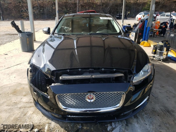 2015 Jaguar XJ with VIN SAJWA2GZ1F8V85688, listed as a Copart auction lot 43112915 with 0 mi miles and Salvage Title. Bid and sale history available at carsss.com. Image 5.