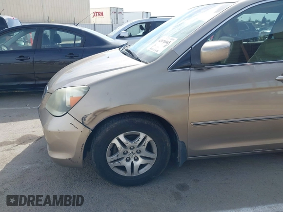 2005 Honda Odyssey EX-L z VIN 5FNRL38615B407908, wystawiony jako IAAI lot #42076045 z przebiegiem 170 950 mil mil oraz . Historia ofert i sprzedaży dostępna na DreamBid. Obrazek 16.