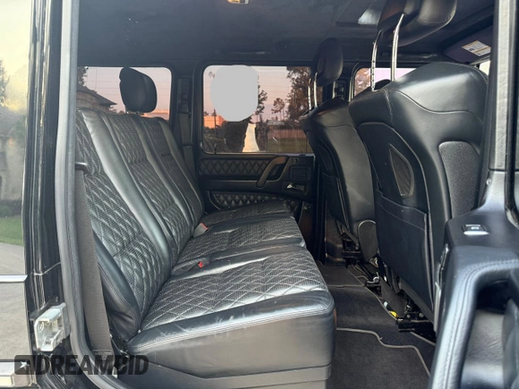 2014 Mercedes-Benz G-Class G 63 AMG with VIN WDCYC7DF2EX216331, listed as a Copart auction lot 53758145 with 128,205 mi miles and Clean Title. Bid and sale history available at carsss.com. Image 6.