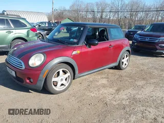 2009 MINI Cooper Hardtop with VIN WMWMF33509TU71339, listed as a IAAI auction lot 41777908 with 155,698 mi miles. Bid and sale history available at carsss.com. Image 2.