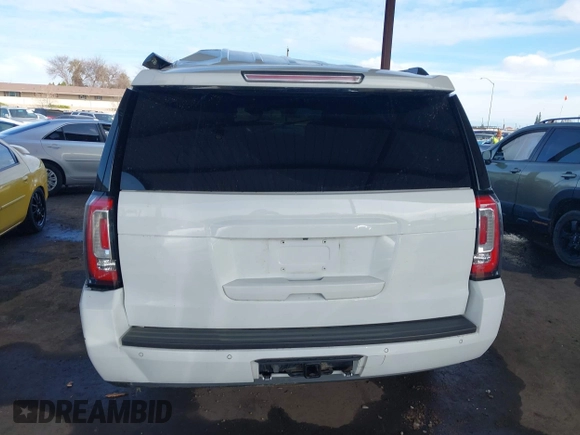2019 GMC Yukon SLT with VIN 1GKS2BKC5KR109529, listed as a IAAI auction lot 41559860 with 136,025 mi miles. Bid and sale history available at carsss.com. Image 17.