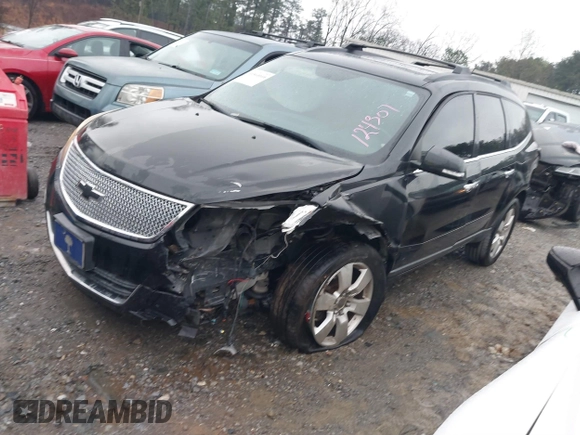 2013 Chevrolet Traverse LT with VIN 1GNKVJKD9DJ124307, listed as a IAAI auction lot 41864010 with 123,458 mi miles and . Bid and sale history available at DreamBid. Image 2.