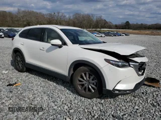 2020 Mazda CX-9 Touring with VIN JM3TCACY5L0415273, listed as a Copart auction lot 44015075 with 82,867 mi miles and Salvage title. Bid and sale history available at DreamBid. Image 4.