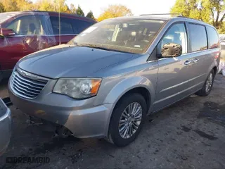 2013 Chrysler Town & Country Touring-L with VIN 2C4RC1CG1DR805496, listed as a IAAI auction lot 41156379 with 191,100 mi miles. Bid and sale history available at carsss.com. Image 2.