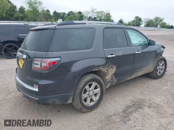 2014 GMC Acadia SLE with VIN 1GKKRNED8EJ325265, listed as a IAAI auction lot 41856162 with 145,022 mi miles and . Bid and sale history available at carsss.com. Image 4.