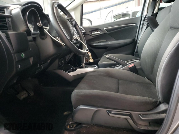 2016 Honda Fit EX with VIN JHMGK5H75GX034913, listed as a Copart auction lot 63948425 with 106,684 mi miles and Salvage title. Bid and sale history available at DreamBid. Image 7.