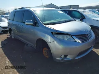 2013 Toyota Sienna XLE AAS with VIN 5TDYK3DC9DS304059, listed as a IAAI auction lot 41883196 with 170,842 mi miles and . Bid and sale history available at carsss.com. Image 1.