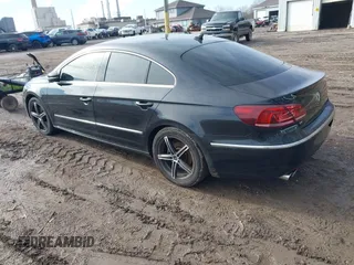 2014 Volkswagen CC Sport with VIN WVWBP7AN4EE534247, listed as a IAAI auction lot 41542076 with 119,199 mi miles and . Bid and sale history available at DreamBid. Image 3.