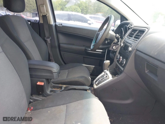 2012 Dodge Caliber SXT with VIN 1C3CDWDA6CD510605, listed as a IAAI auction lot 42104688 with 221,059 mi miles. Bid and sale history available at carsss.com. Image 5.