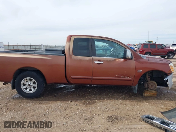 2004 Nissan Titan XE with VIN 1N6AA06A04N508069, listed as a IAAI auction lot 41571931 with 180,119 mi miles. Bid and sale history available at carsss.com. Image 14.