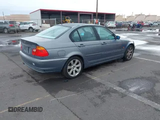 1999 BMW 3 Series 323i with VIN WBAAM3332XCA80930, listed as a IAAI auction lot 41827318 with 93,055 mi miles. Bid and sale history available at carsss.com. Image 4.