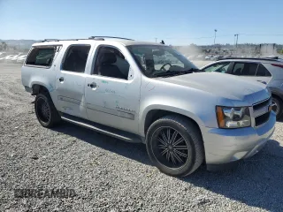 2013 Chevrolet Suburban LT with VIN 1GNSCJE05DR371789, listed as a Copart auction lot 60755775 with 233,275 mi miles and Salvage title. Bid and sale history available at DreamBid. Image 4.