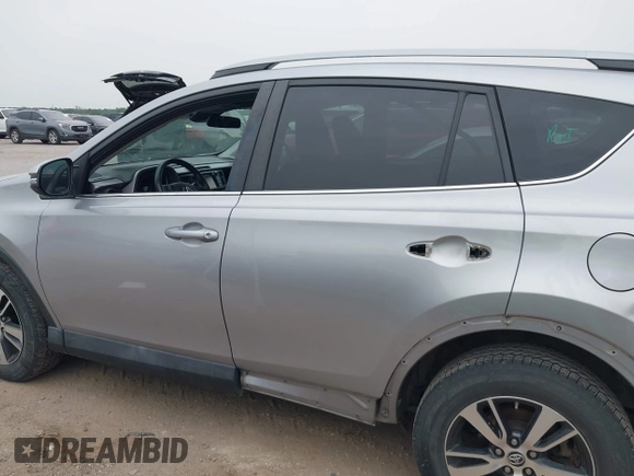 2018 Toyota RAV4 XLE с VIN 2T3WFREV0JW409842, выставлен на аукционе IAAI как лот 42057521 с пробегом 145 915 миль миль и . История ставок и продаж доступна на DreamBid. Изображение 14.