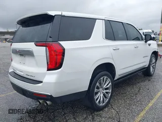 2021 GMC Yukon Denali with VIN 1GKS2DKL8MR125626, listed as a IAAI auction lot 41796439 with 63,001 mi miles. Bid and sale history available at carsss.com. Image 4.