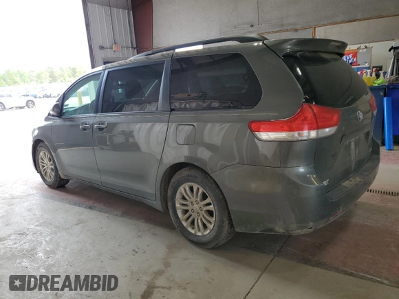 2012 Toyota Sienna XLE AAS с VIN 5TDYK3DCXCS202381, выставлен на аукционе Copart как лот 59002895 с пробегом 272 415 миль миль и Списание • Salvage title. История ставок и продаж доступна на DreamBid. Изображение 2.