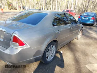 2009 Ford Fusion SEL with VIN 3FAHP08189R105867, listed as a IAAI auction lot 41649133 with 188,691 mi miles. Bid and sale history available at carsss.com. Image 4.