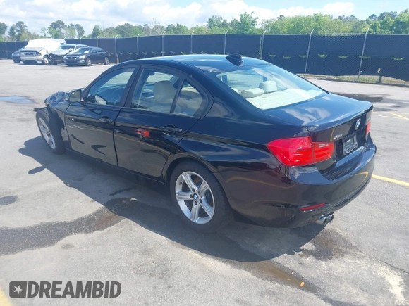 2013 BMW 3 Series 328i xDrive with VIN WBA3B5C58DF138736, listed as a IAAI auction lot 41981208 with 113,510 mi miles. Bid and sale history available at carsss.com. Image 3.