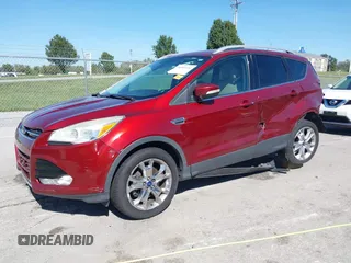 2015 Ford Escape Titanium with VIN 1FMCU9J92FUA53699, listed as a IAAI auction lot 40500310 with 197,581 mi miles. Bid and sale history available at carsss.com. Image 20.
