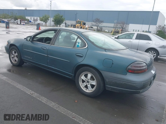1997 Pontiac Grand Prix SE with VIN 1G2WJ52K0VF249961, listed as a IAAI auction lot 41512770 with 168,408 mi miles. Bid and sale history available at carsss.com. Image 3.
