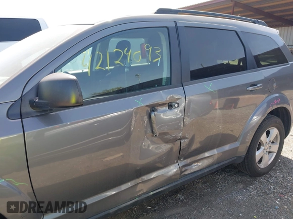 2013 Dodge Journey American Value with VIN 3C4PDCAB5DT509059, listed as a IAAI auction lot 42124093 with 162,904 mi miles and . Bid and sale history available at DreamBid. Image 6.