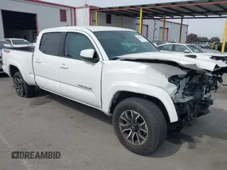 2023 Toyota Tacoma SR5 z VIN 3TMDZ5BN8PM167260, wystawiony jako IAAI lot #41689291 z przebiegiem 24 805 mil mil oraz . Historia ofert i sprzedaży dostępna na DreamBid. Obrazek 1.