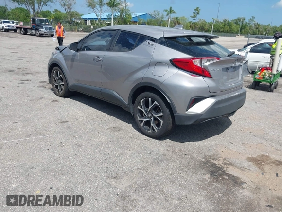 2019 Toyota C-HR XLE with VIN NMTKHMBX8KR093044, listed as a IAAI auction lot 41939036 with 60,130 mi miles. Bid and sale history available at carsss.com. Image 3.