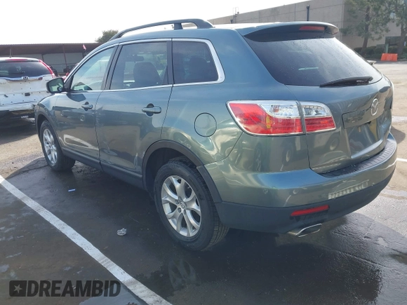 2011 Mazda CX-9 Touring z VIN JM3TB3CV6B0308283, wystawiony jako IAAI lot #41739538 z przebiegiem 96 507 mil mil oraz . Historia ofert i sprzedaży dostępna na DreamBid. Obrazek 3.