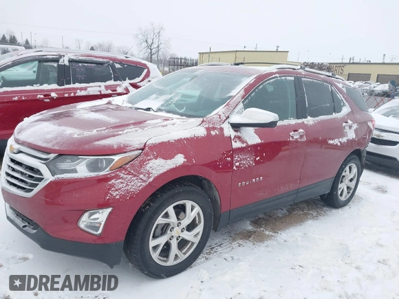 2021 Chevrolet Equinox Premier z VIN 2GNAXXEV4M6105996, wystawiony jako IAAI lot #41402065 z przebiegiem 51 083 mil mil oraz . Historia ofert i sprzedaży dostępna na DreamBid. Obrazek 19.