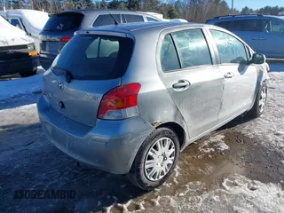 2010 Toyota Yaris with VIN JTDKT4K32A5293998, listed as a IAAI auction lot 41635631 with 221,414 mi miles. Bid and sale history available at carsss.com. Image 4.