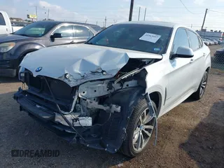 2018 BMW X6 xDrive35i with VIN 5UXKU2C55J0X49585, listed as a IAAI auction lot 41513997 with 57,204 mi miles. Bid and sale history available at carsss.com. Image 6.