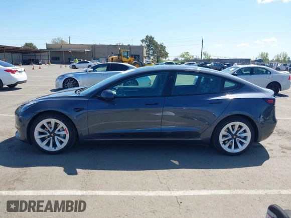 2022 Tesla Model 3 with VIN 5YJ3E1EA6NF144098, listed as a IAAI auction lot 41965360 with 75,597 mi miles. Bid and sale history available at carsss.com. Image 14.