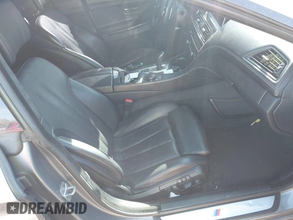 2016 BMW 6 Series 640i xDrive with VIN WBA6D2C58GGT66160, listed as a IAAI auction lot 41130666 with 102,064 mi miles and . Bid and sale history available at carsss.com. Image 5.