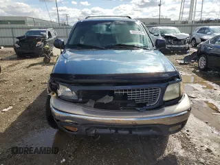 1999 Ford Expedition XLT z VIN 1FMPU18L5XLB51556, wystawiony jako Copart lot #49698855 z przebiegiem 194 898 mil mil oraz Szkoda całkowita • Salvage title. Historia ofert i sprzedaży dostępna na DreamBid. Obrazek 5.