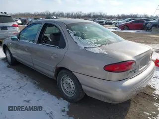 1996 Ford Contour LX с VIN 1FALP6530TK105053, выставлен на аукционе IAAI как лот 41287231 с пробегом 115 177 миль миль и . История ставок и продаж доступна на DreamBid. Изображение 3.