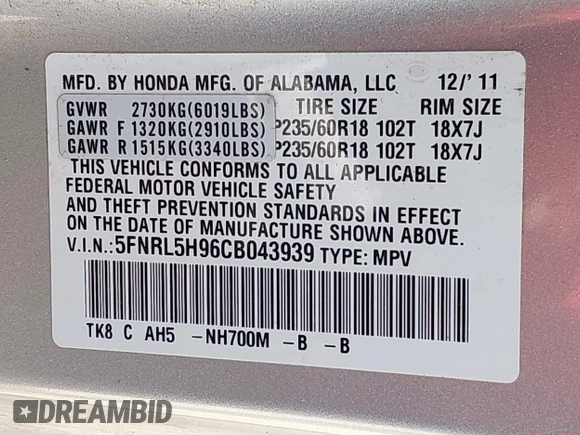 2012 Honda Odyssey Touring with VIN 5FNRL5H96CB043939, listed as a IAAI auction lot 41983643 with 202,535 mi miles. Bid and sale history available at carsss.com. Image 9.