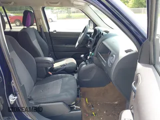 2016 Jeep Patriot Sport with VIN 1C4NJPBAXGD670093, listed as a IAAI auction lot 42429998 with 165,763 mi miles and . Bid and sale history available at DreamBid. Image 5.